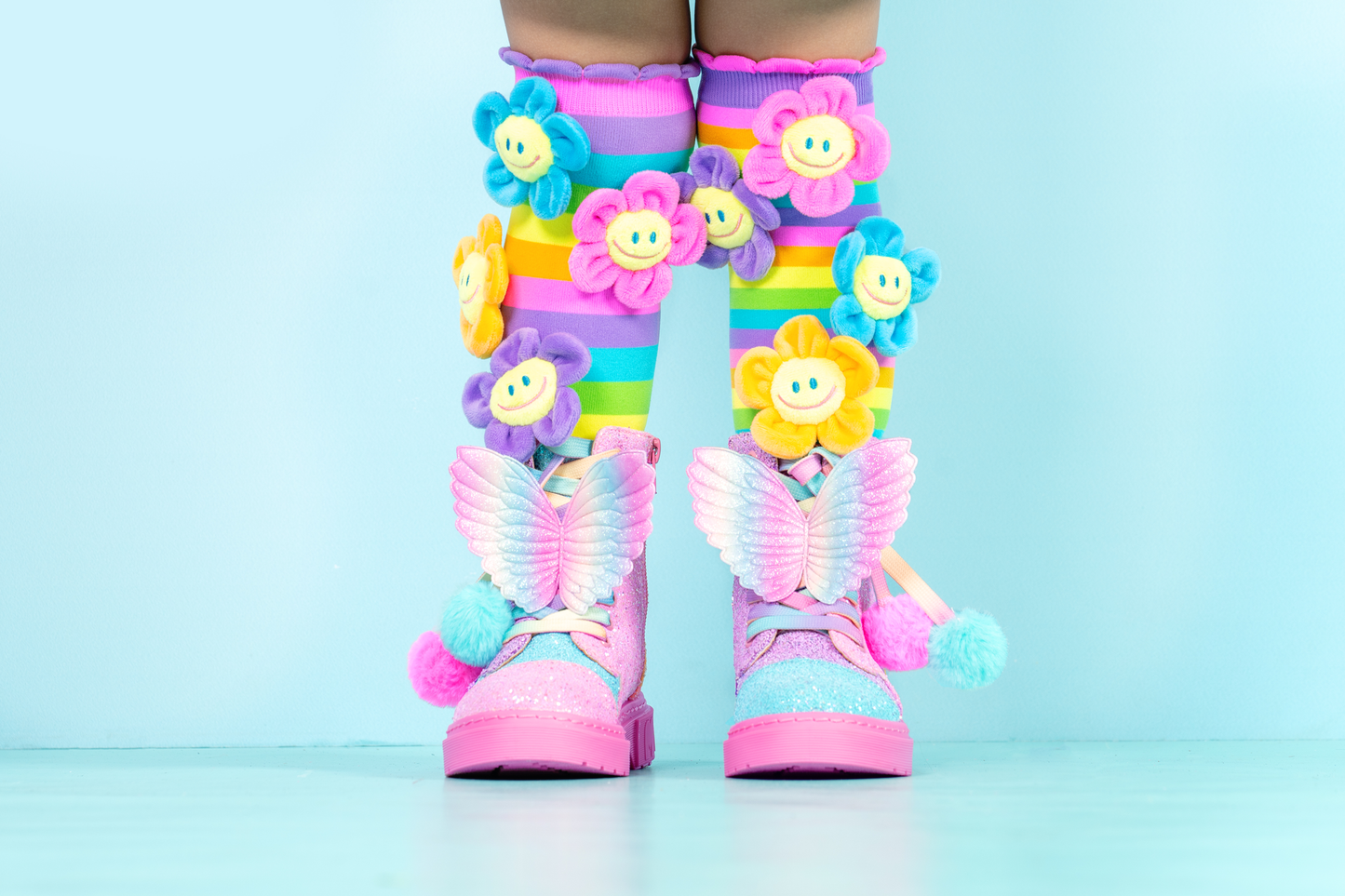 Fun flower knee high socks for kids and adults with bright colors and plush floral details.