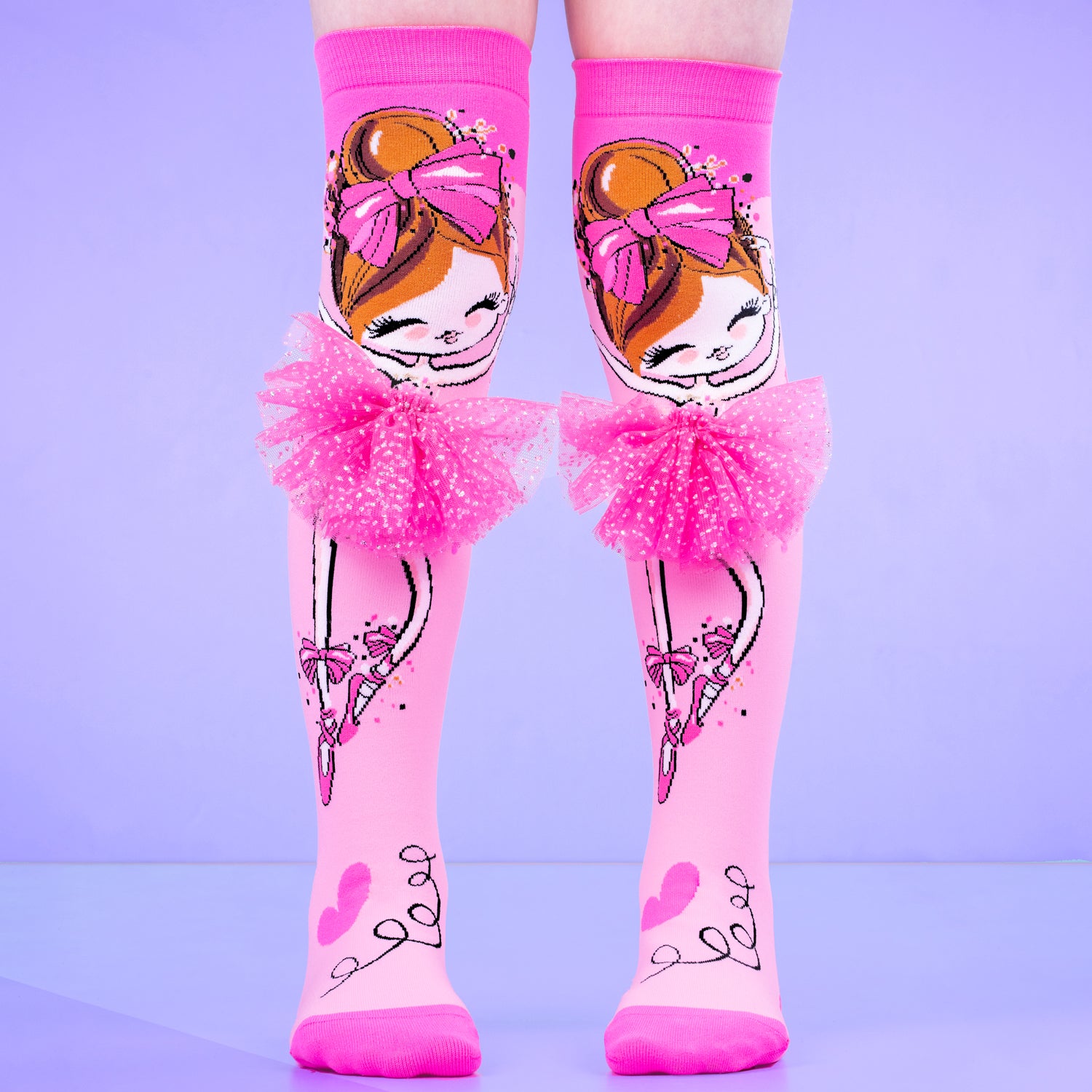Ballerina knee high socks for kids and adults featuring colorful design and a soft tutu detail at the top.