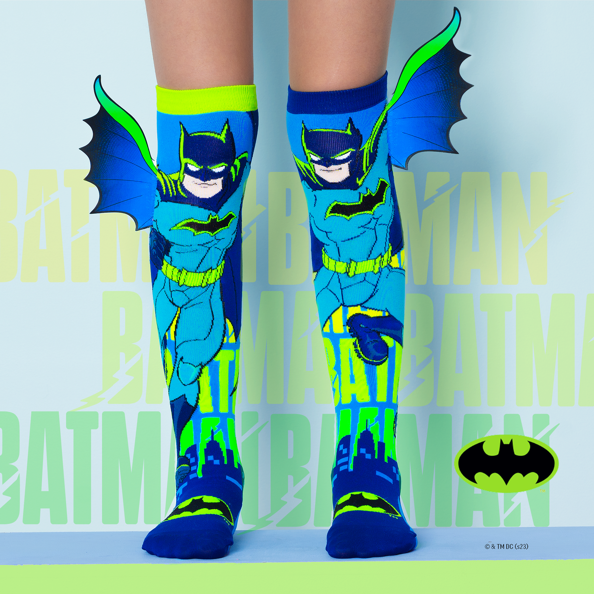 Batman novelty socks featuring 3D bat wings and playful comic book superhero style.