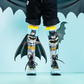Batman superhero knee high socks with iconic emblem and attached 3D bat wings.