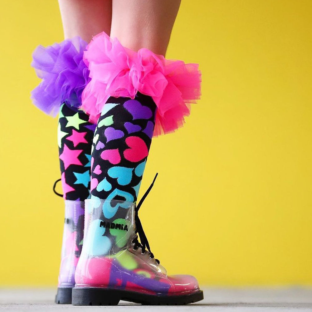 Bright crazy socks featuring colorful patterns and funky frill accents for fun outfits.