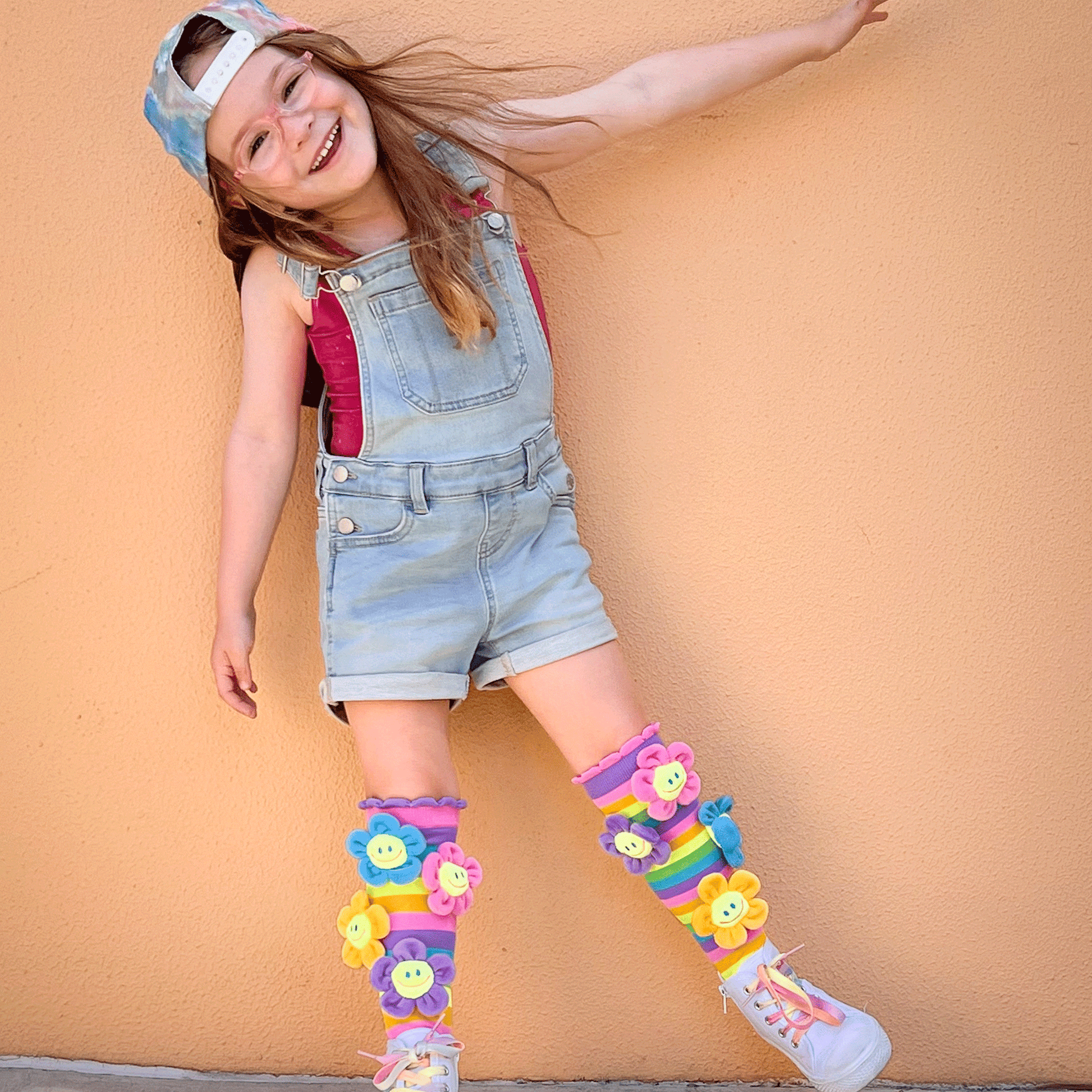 Bright flower knee high socks with cheerful colors and plush flower accents for fun outfits.
