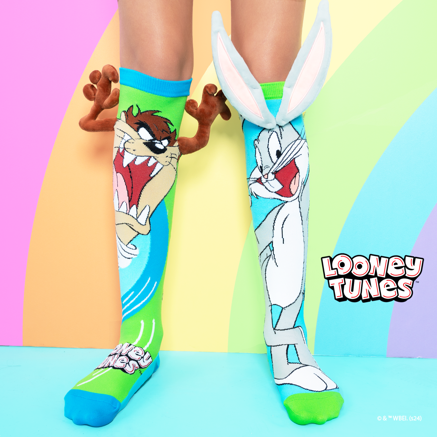 Bugs Bunny and Taz novelty socks featuring plush bunny ears, 3D arms, and colorful playful design.