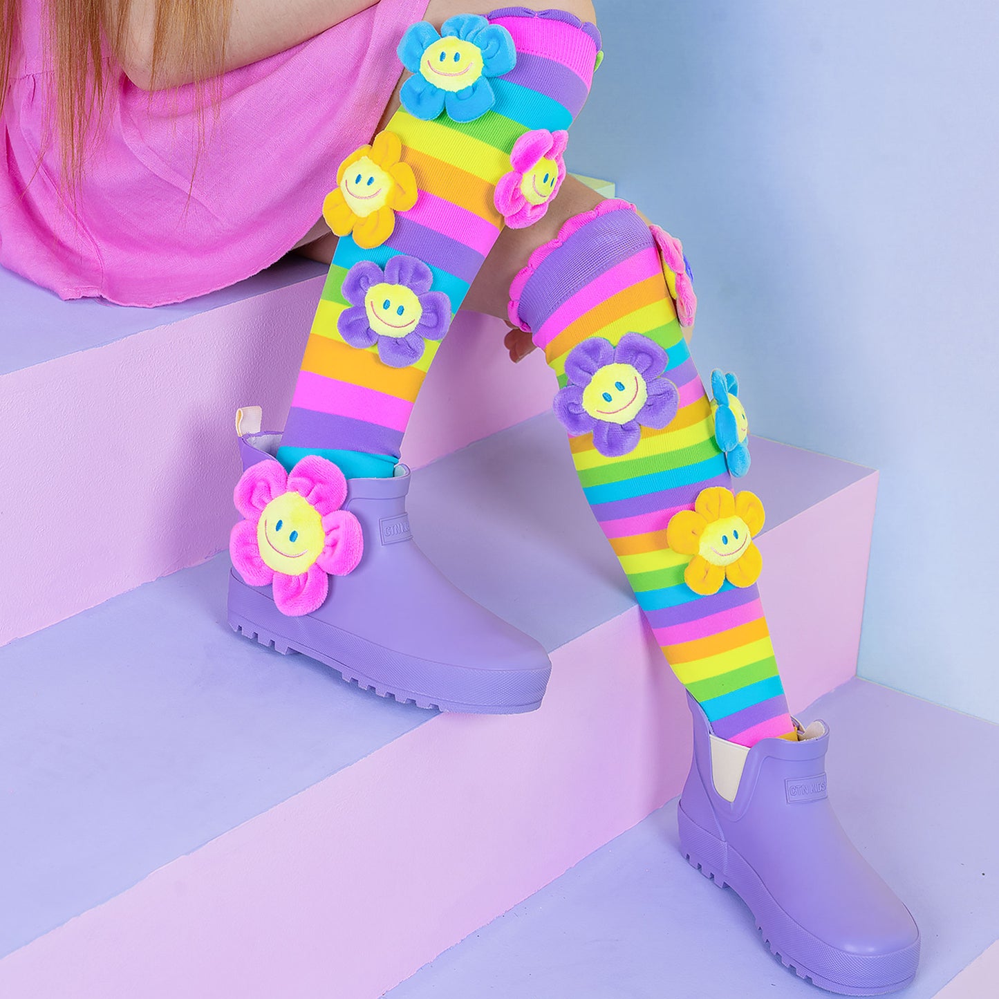 Cheerful flower socks with bright colors and plush floral details for fun everyday wear.
