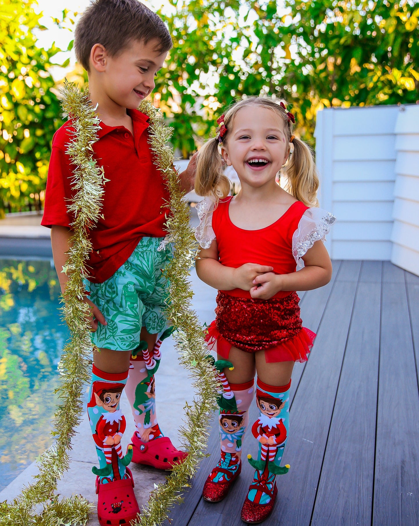 Christmas Wonderland elf socks with colorful festive graphics and soft plush elf details.