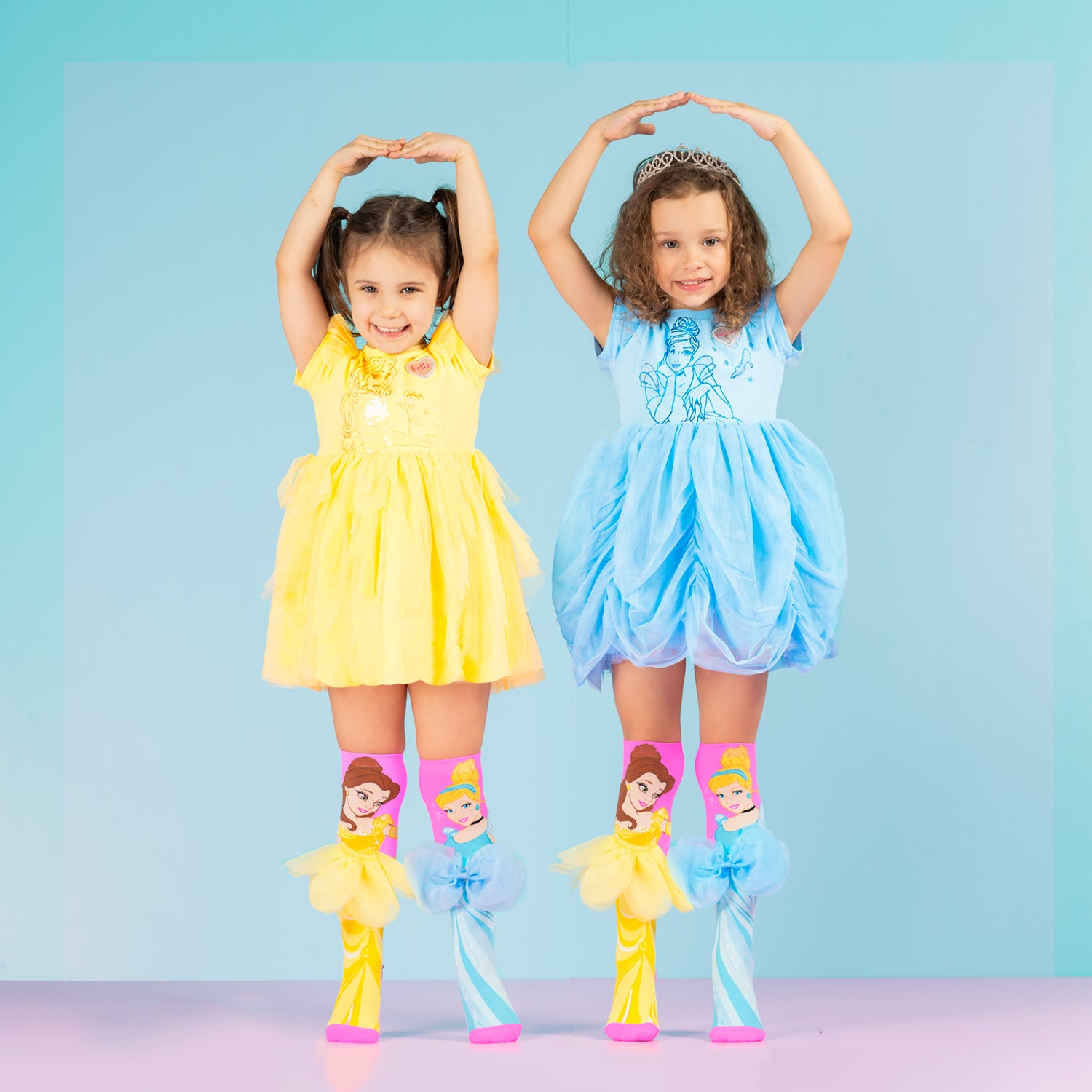 Colorful Disney Princess knee high socks for kids with Belle and Cinderella and 3D dress details.