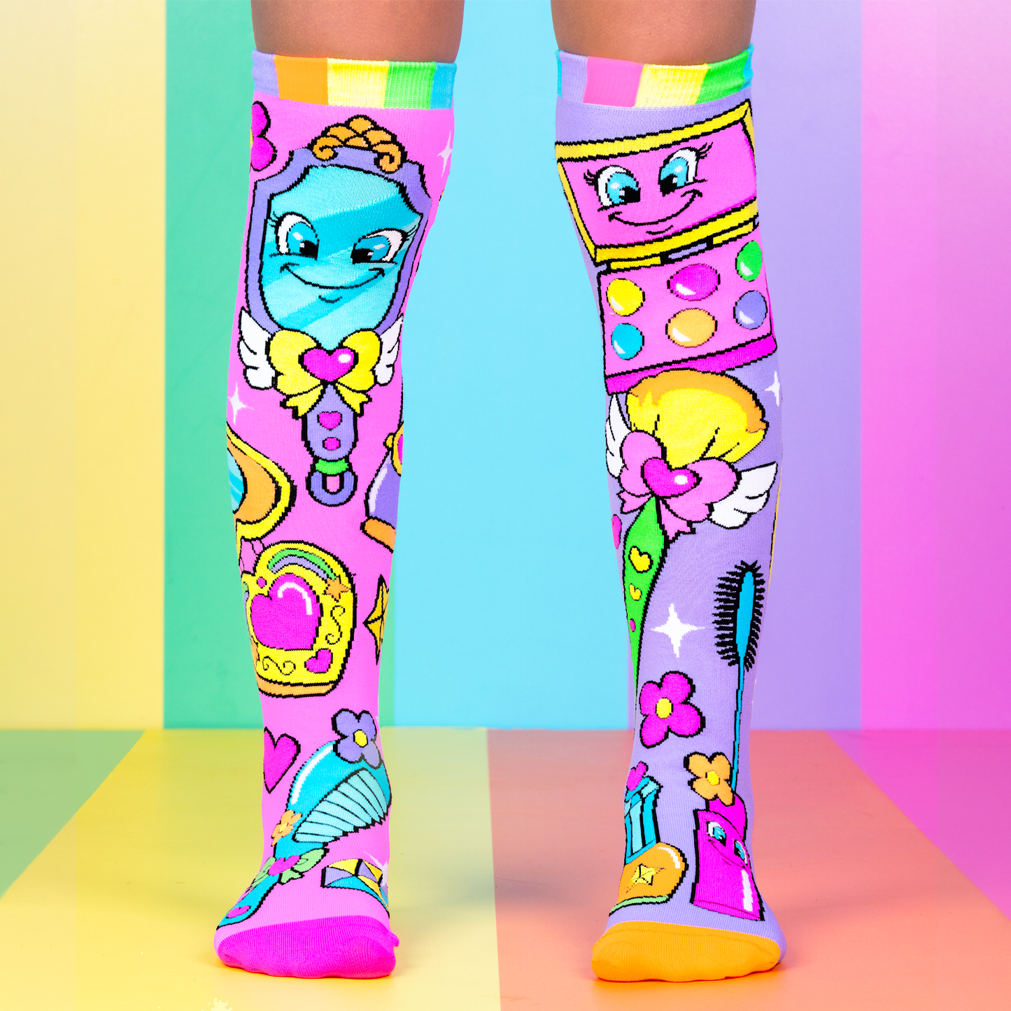 Fun makeup novelty socks for kids featuring bright colors, beauty accessories, and playful glam design.
