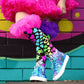 Colorful novelty socks with bold bright colors and playful fashion-inspired frill details.
