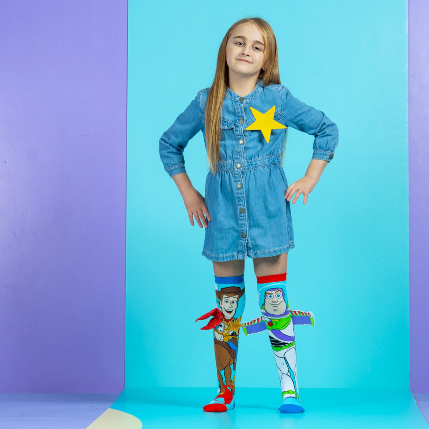 Colorful Toy Story knee high socks for kids featuring Woody and Buzz with 3D wings and fun design.