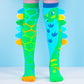 Fun novelty socks featuring dinosaur scales and soft 3D spine details
