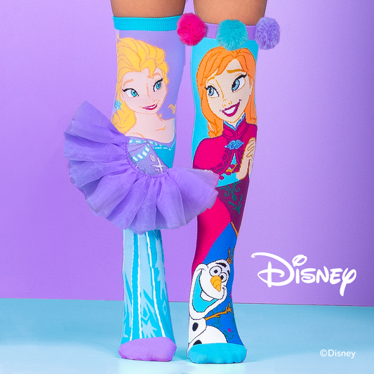 Disney Frozen knee high socks featuring Elsa, Anna, and Olaf with colorful winter-inspired design.