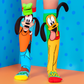 Disney Goofy socks featuring iconic green hat and playful bouncy ears in colorful design.