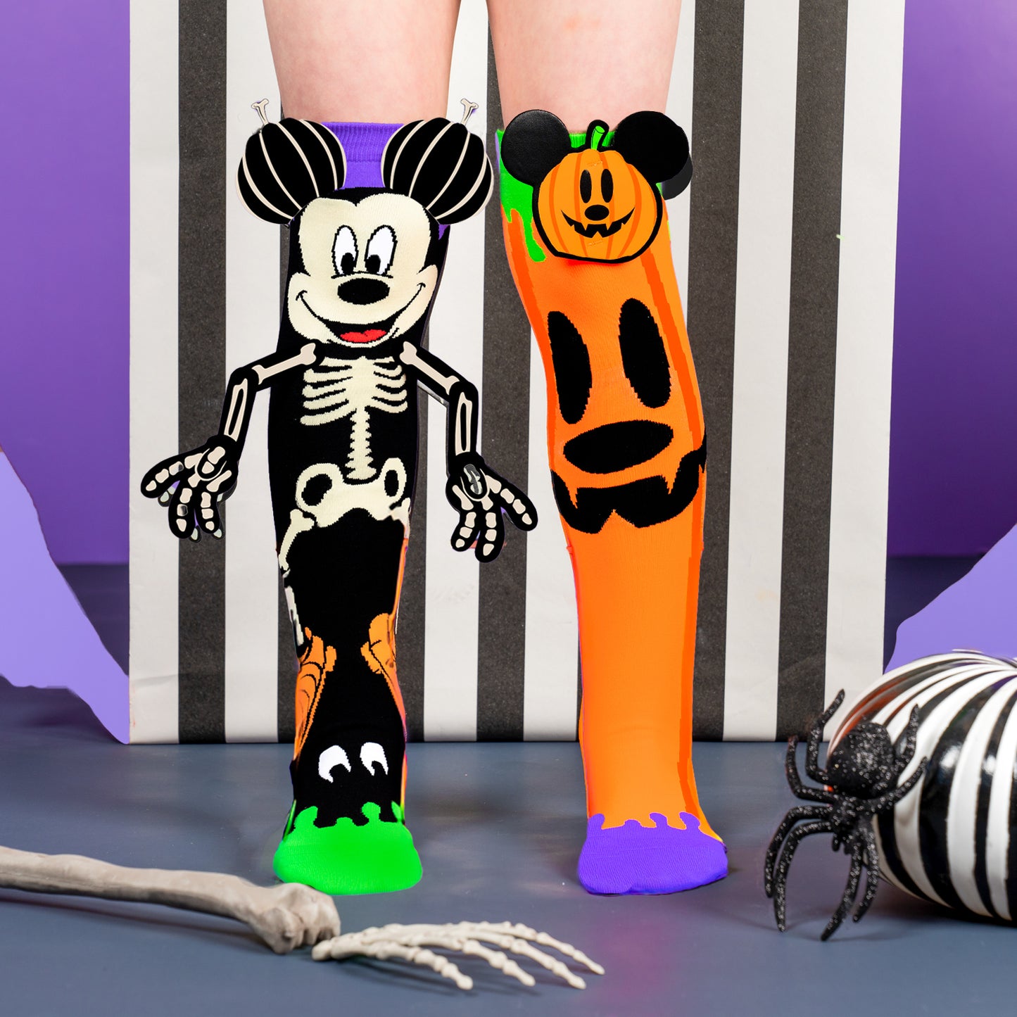 Disney Halloween Mickey and pumpkin novelty socks with vibrant colors and playful spooky theme.