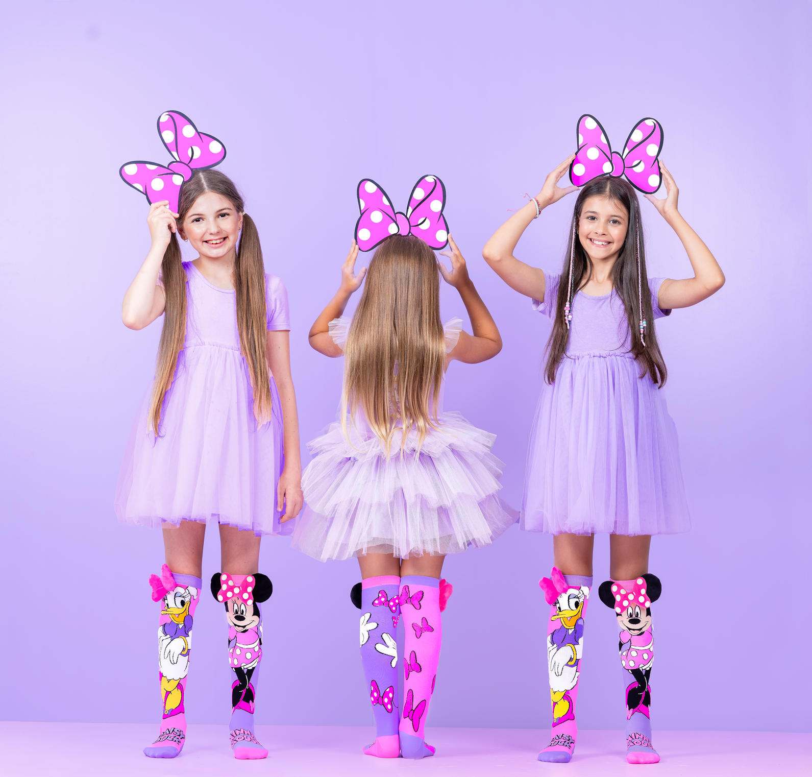 Disney Mickey and Friends Minnie and Daisy socks featuring fun cartoon graphics and colorful design.