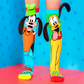 Disney Pluto and Goofy knee high socks featuring colorful character design and playful bouncy ears.