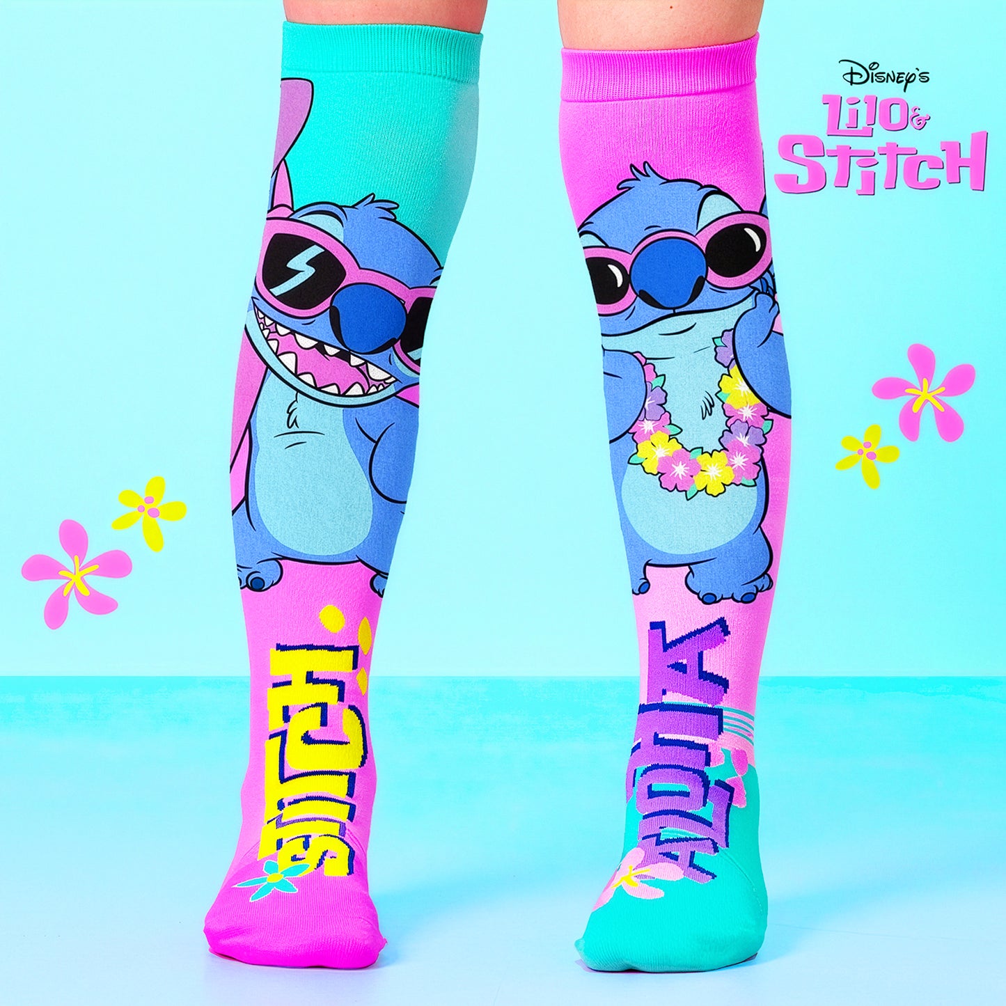 Cute Stitch novelty socks with Hawaiian flower graphics and colorful Disney character design.