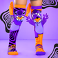 Disney Stitchzilla Halloween socks with neon purple monster graphics, orange accents, and 3D plush arms and ears.