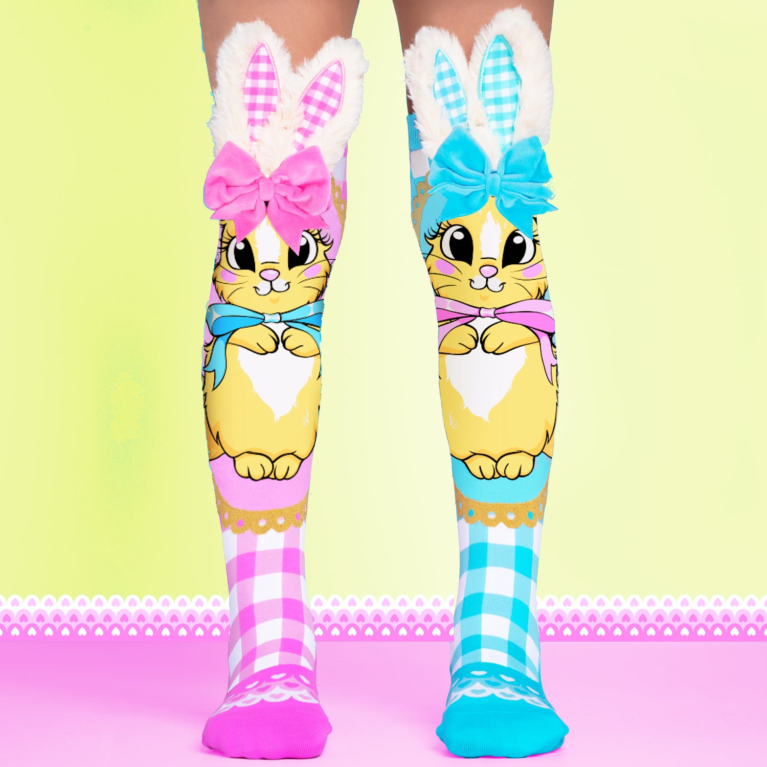 Cute bunny character socks with fluffy ears and colorful bow accents.