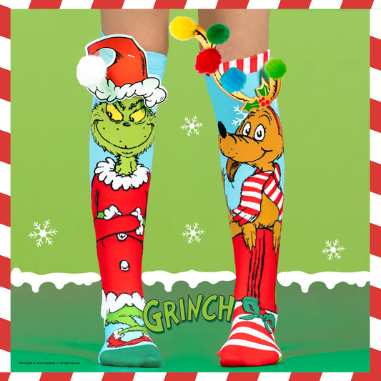 Grinch and Max Christmas knee high socks for kids and adults featuring festive characters and bright holiday colors.
