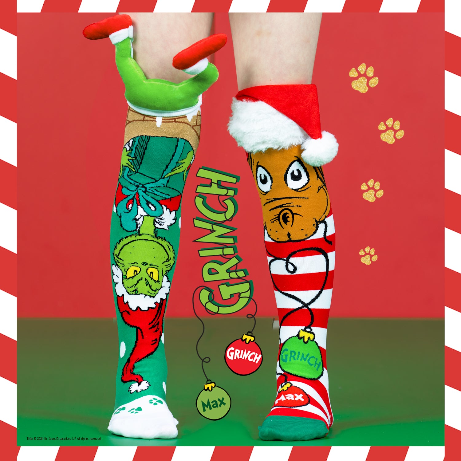 Grinch and the Chimney knee high socks featuring a 3D plush Grinch in Santa suit hanging upside down from a chimney.