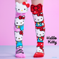 Cute Sanrio Hello Kitty socks in red and pink with cartoon character artwork