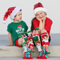 Holiday elf novelty socks with attached plush elf details and bright Christmas colors.