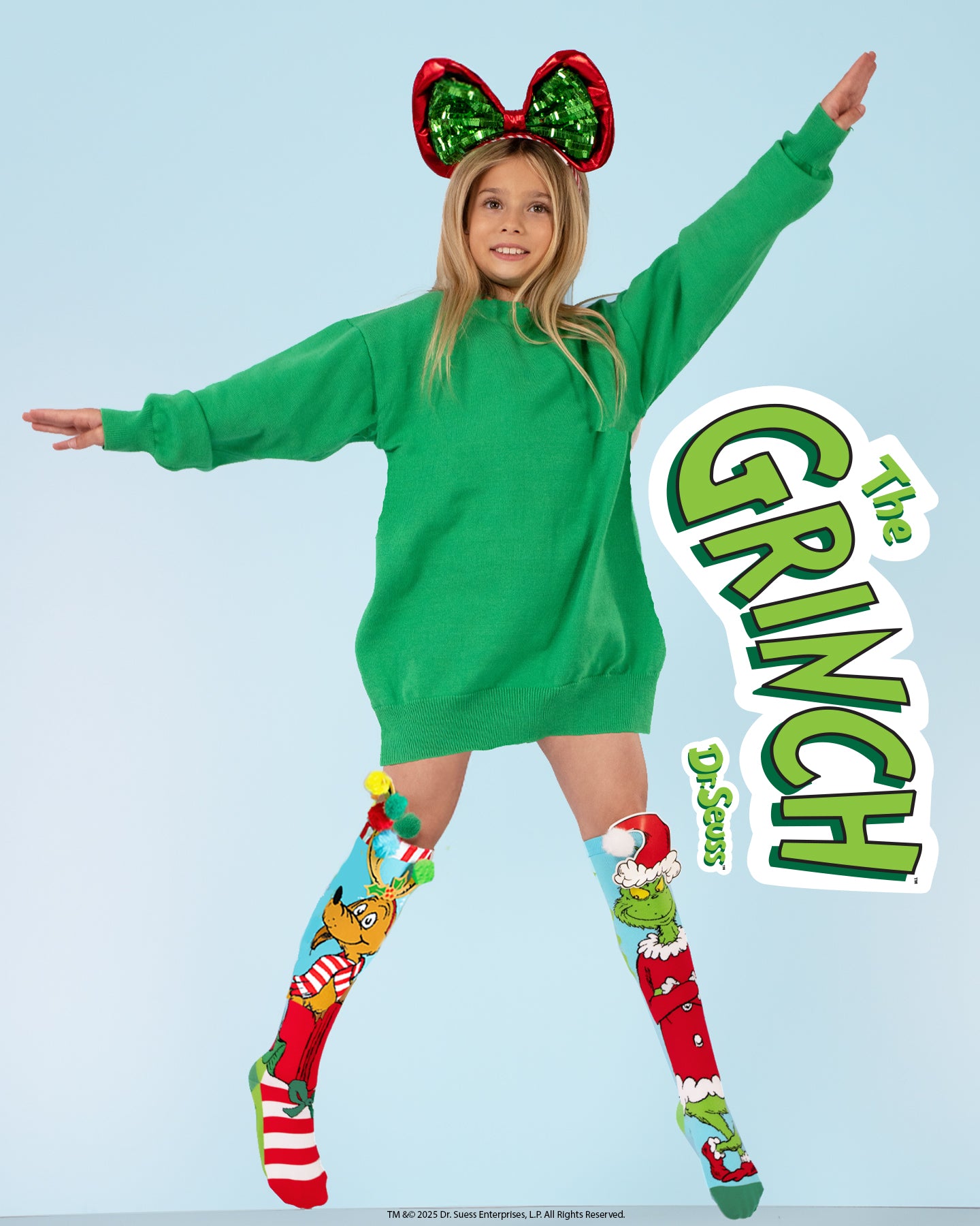 Holiday Grinch socks featuring Max with antlers and the Grinch in Santa outfit with playful design.