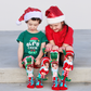 Holiday plush elf knee high socks with bright Christmas colors and playful seasonal graphics.