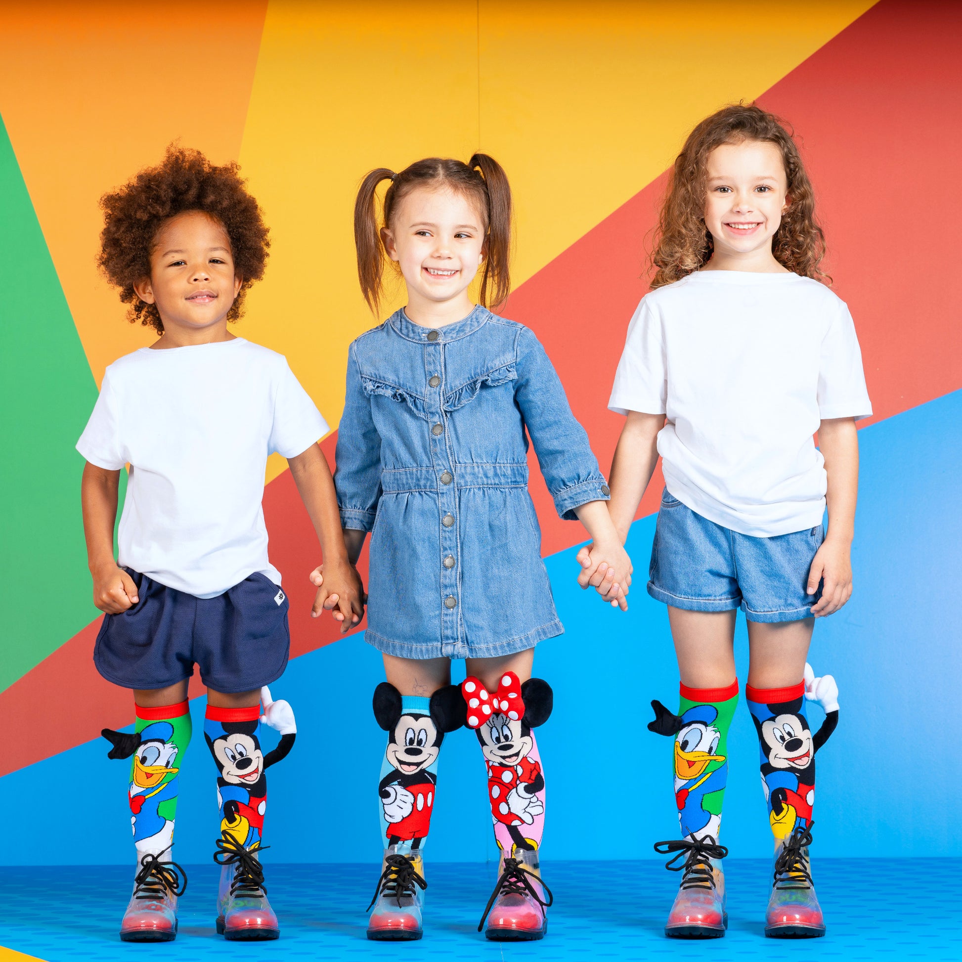 Kids Disney Mickey and Donald socks featuring fun character graphics and playful 3D details.