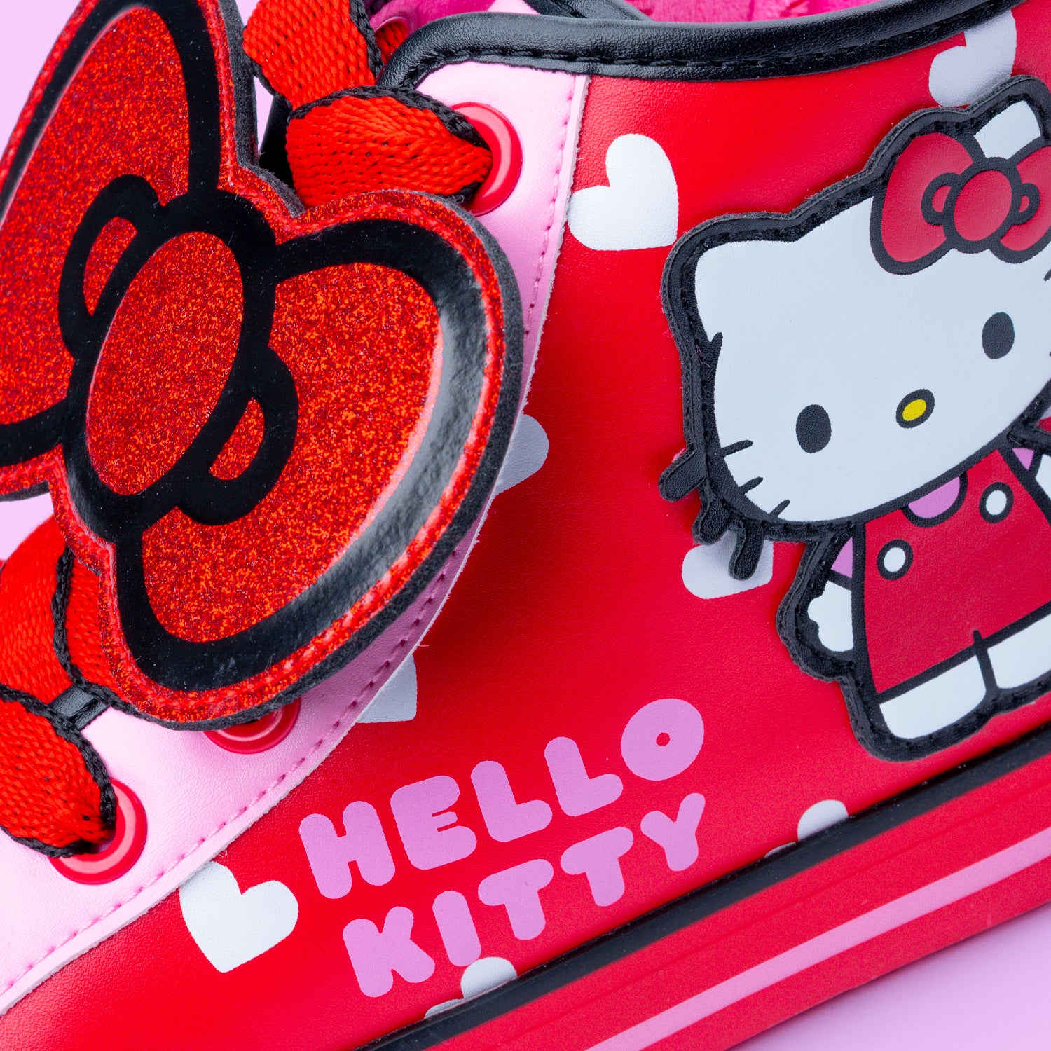 Cute Hello Kitty fashion shoes with glitter details and pink laces