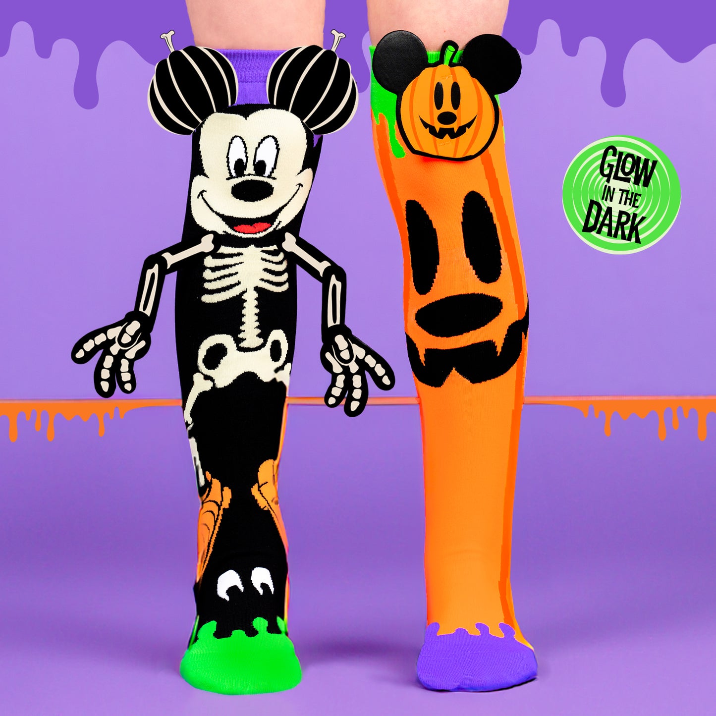 Kids Mickey Halloween socks with glow in the dark effect and bright spooky character graphics.