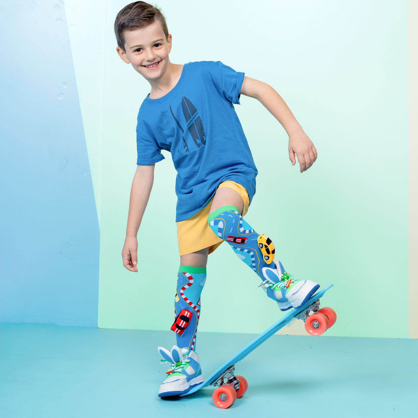 Kids racing car socks with colorful racing-inspired details and playful car design.