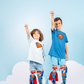 Kids Superman socks featuring velvet cape, embroidered logo, and playful 3D superhero details.