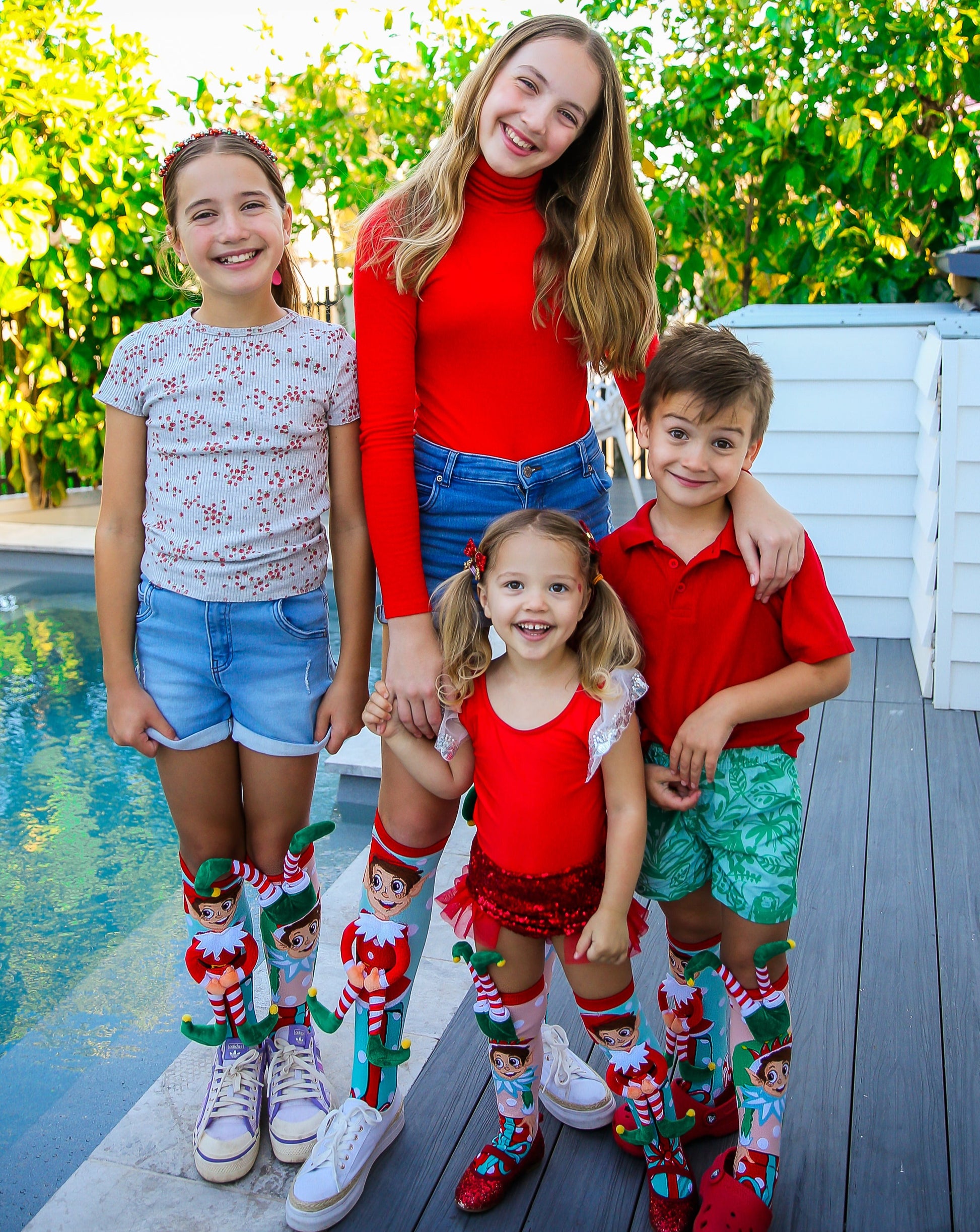Christmas elf socks for kids and adults with bright festive colors and playful plush elf accents.