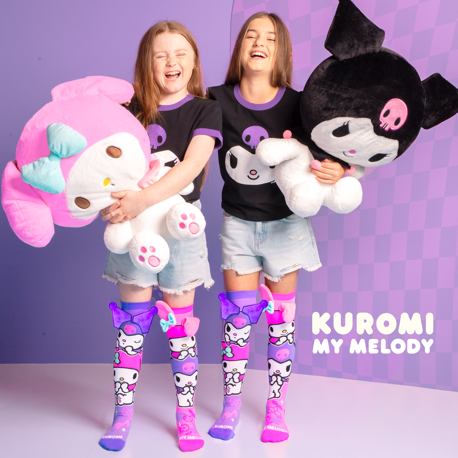 Kids wearing Kuromi and My Melody knee high socks with plush 3D bows and ears