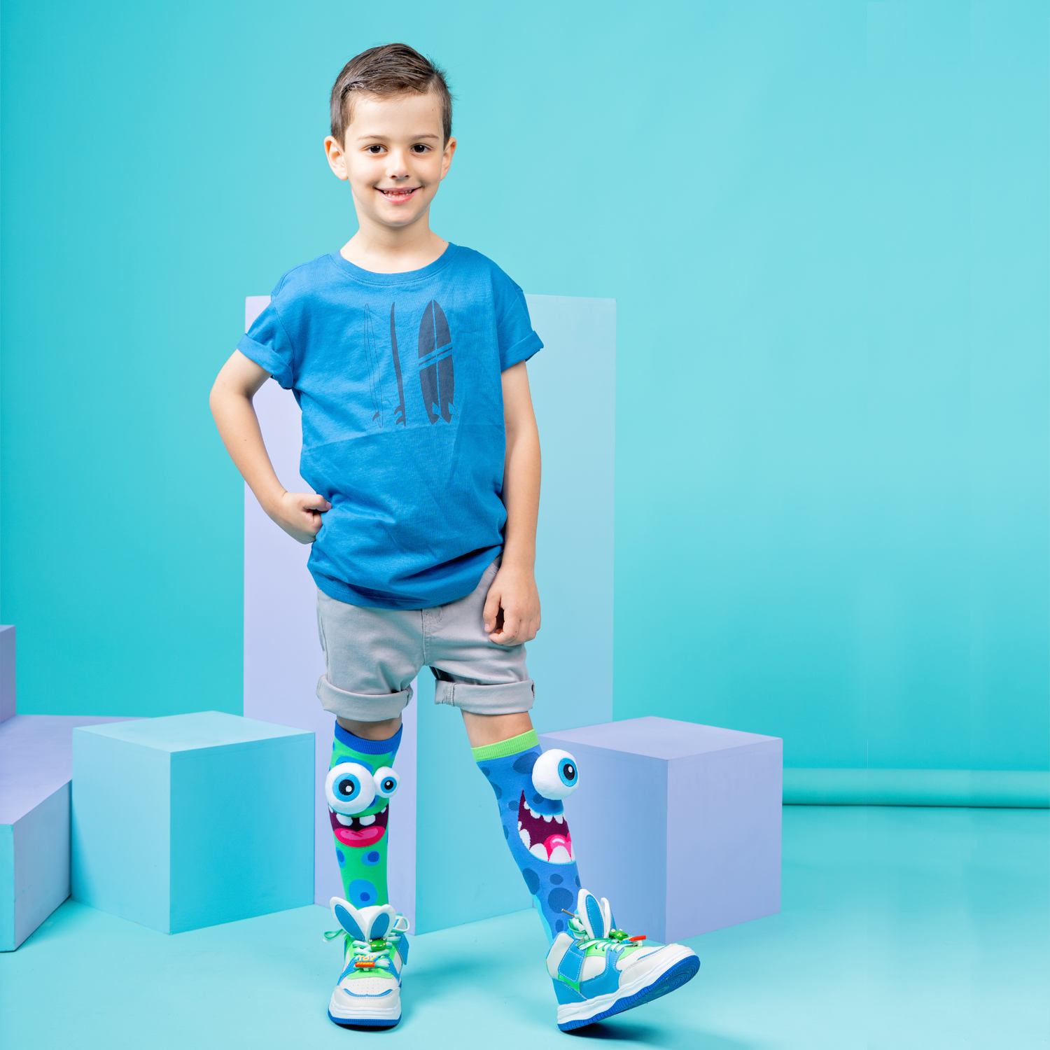 Monster novelty socks with playful colorful patterns and soft plush 3D eye details.