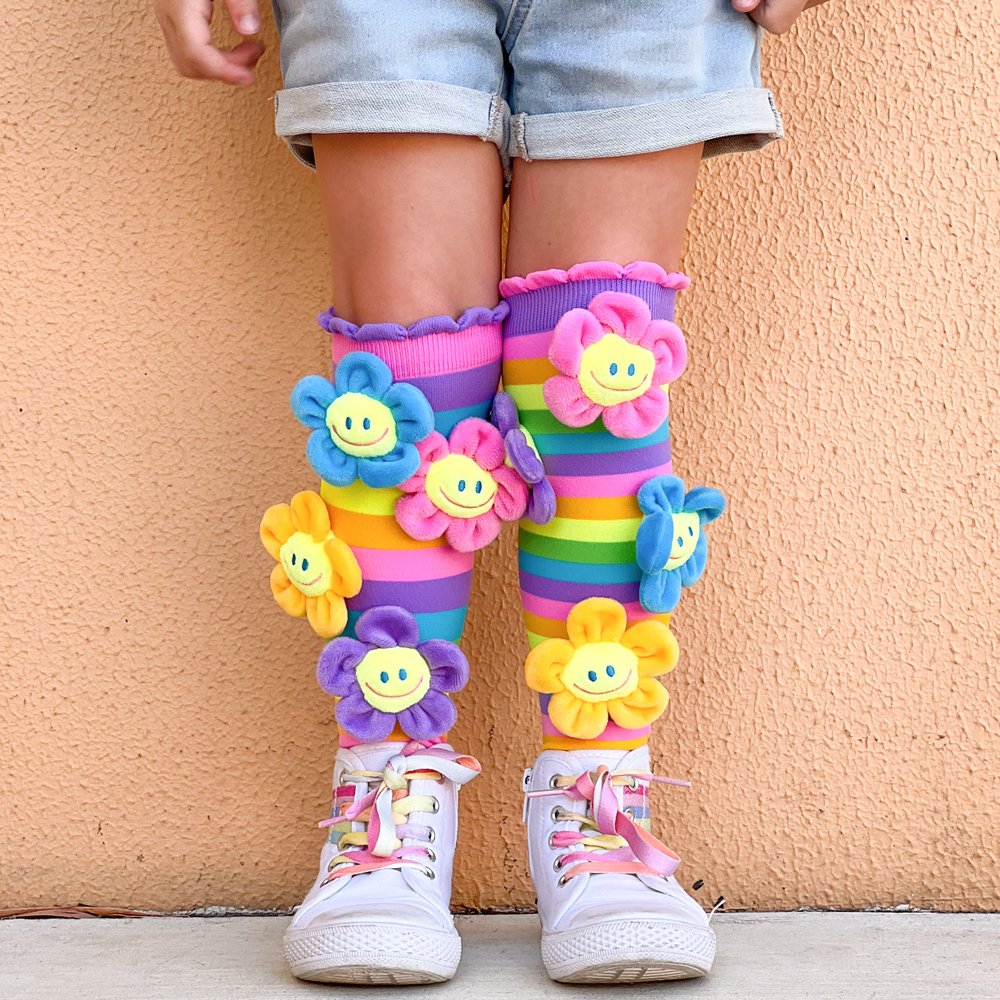 Plush flower knee high socks with colorful floral patterns and fun spring-inspired style.