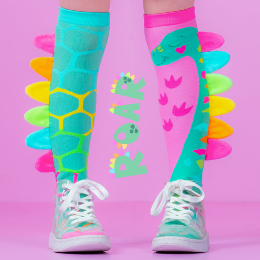 Roar dinosaur knee high socks for kids and adults featuring vibrant colors, cute dinosaur design, and plush spikes detail.