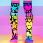Starry Heart knee high novelty socks for kids featuring colorful stars, bright hearts, and playful neon design