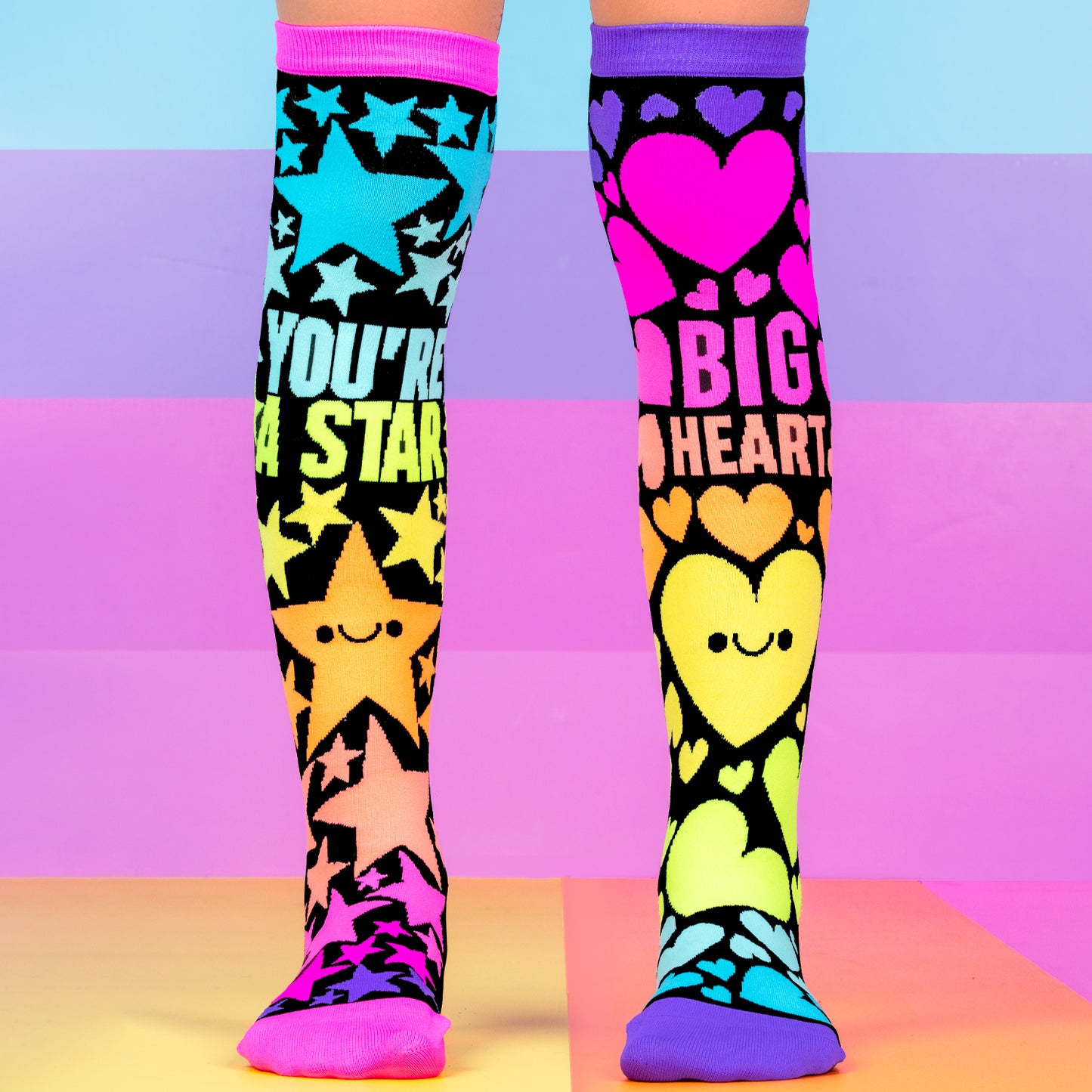 Starry Heart knee high novelty socks for kids featuring colorful stars, bright hearts, and playful neon design