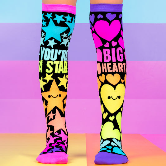 Starry Heart knee high novelty socks for kids featuring colorful stars, bright hearts, and playful neon design