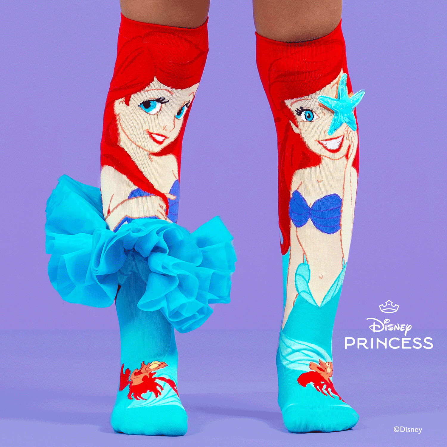 Colourful Disney Little Mermaid Ariel knee-high socks by MADMIA with bright 3D character details.