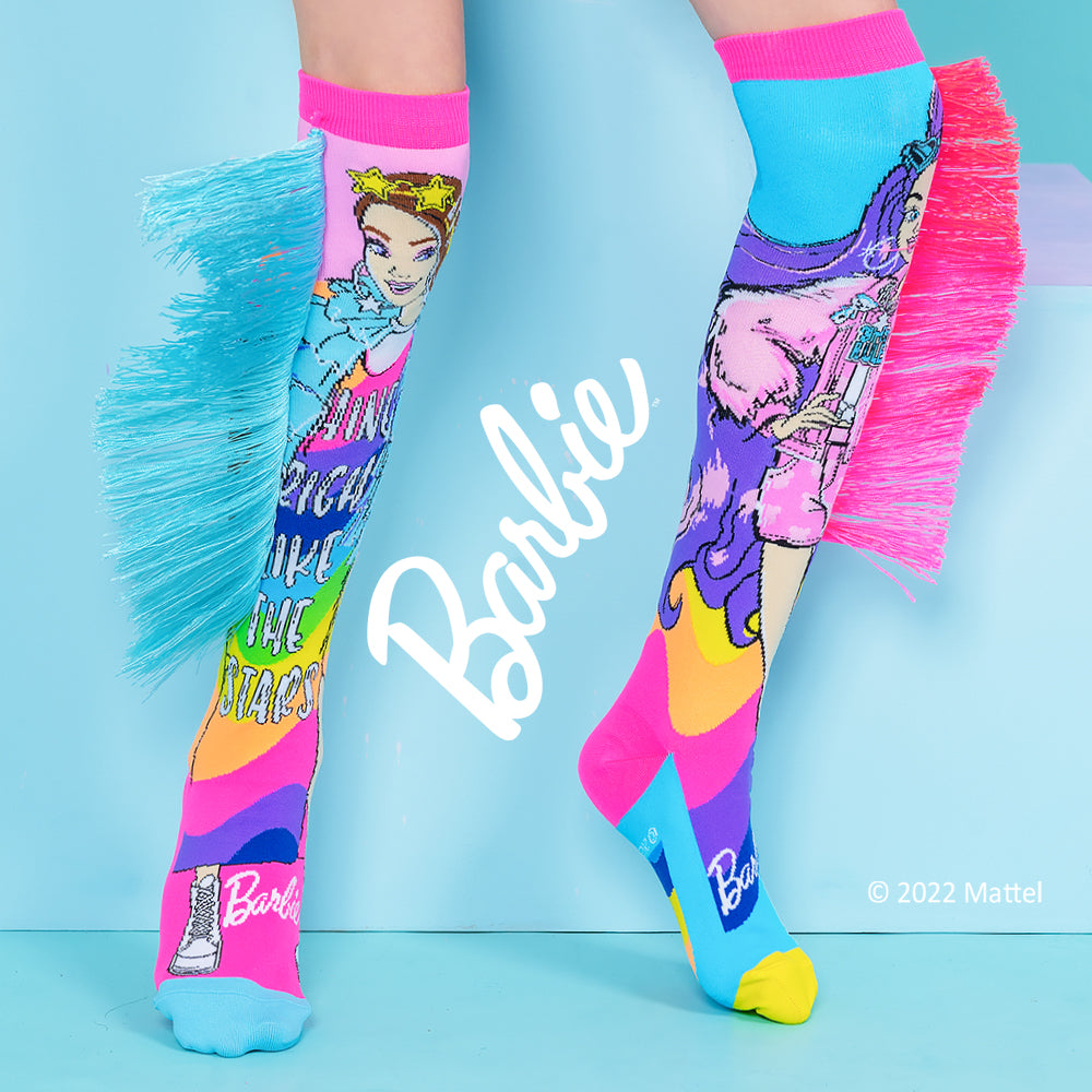 Barbie Extra Fashionista novelty socks with bold Barbie-inspired colors and flowing tassel accents.