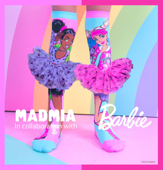 Barbie knee high socks featuring colorful design and attached 3D tutu skirt details.