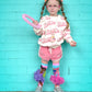 Colorful Barbie knee high socks with playful fashion-inspired graphics and tutu details.