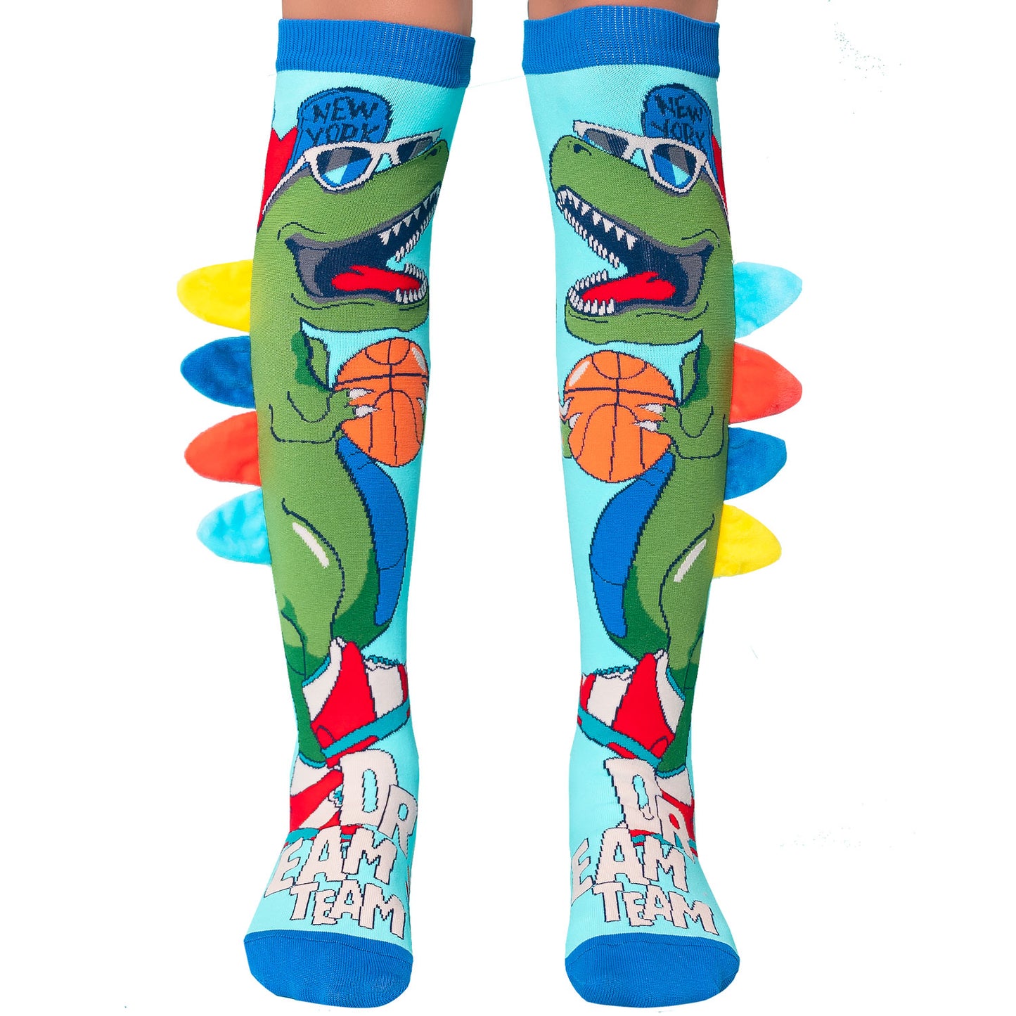 Dinosaur knee high socks featuring colorful Jurassic-inspired design and plush spike details.