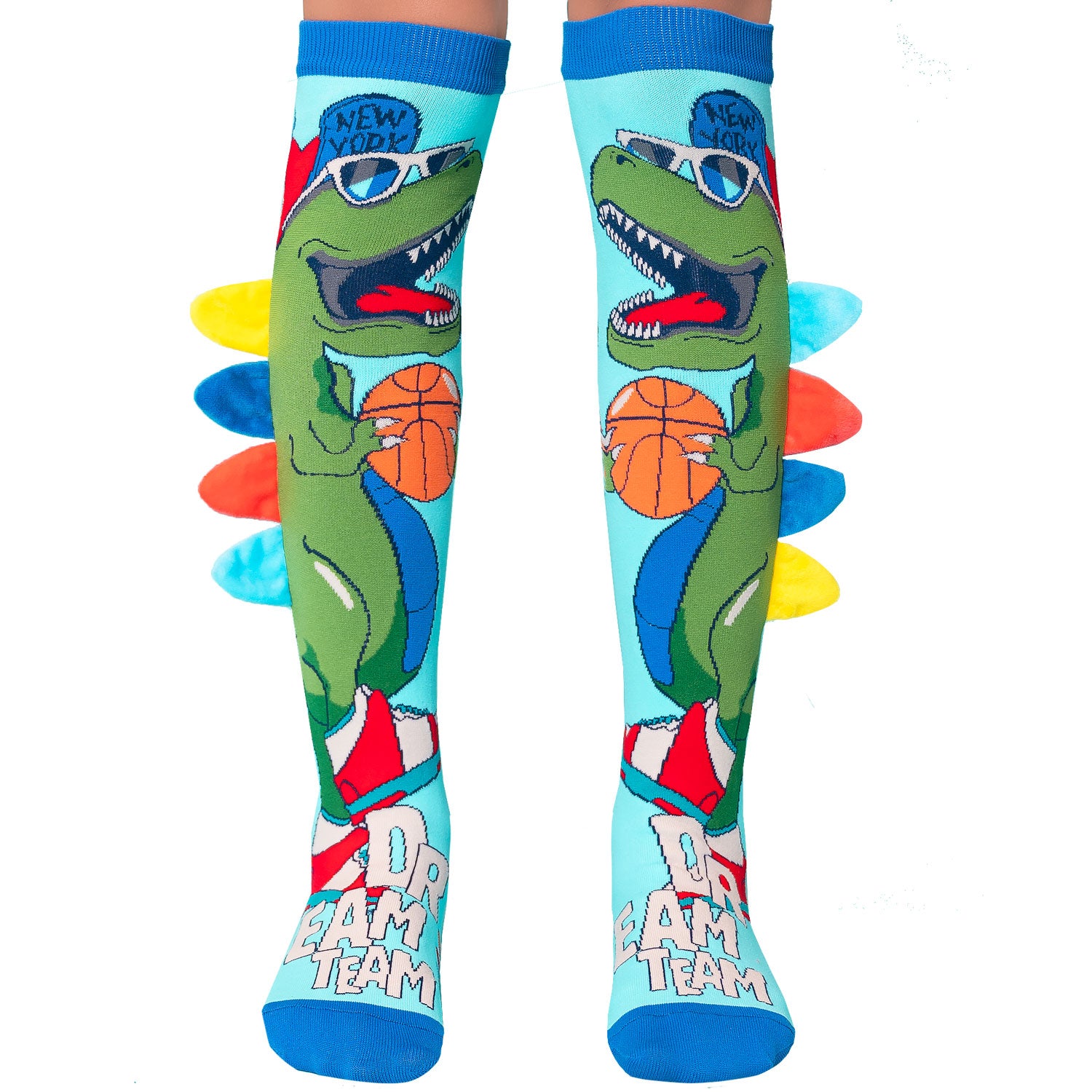 Dinosaur knee high socks featuring colorful Jurassic-inspired design and plush spike details.