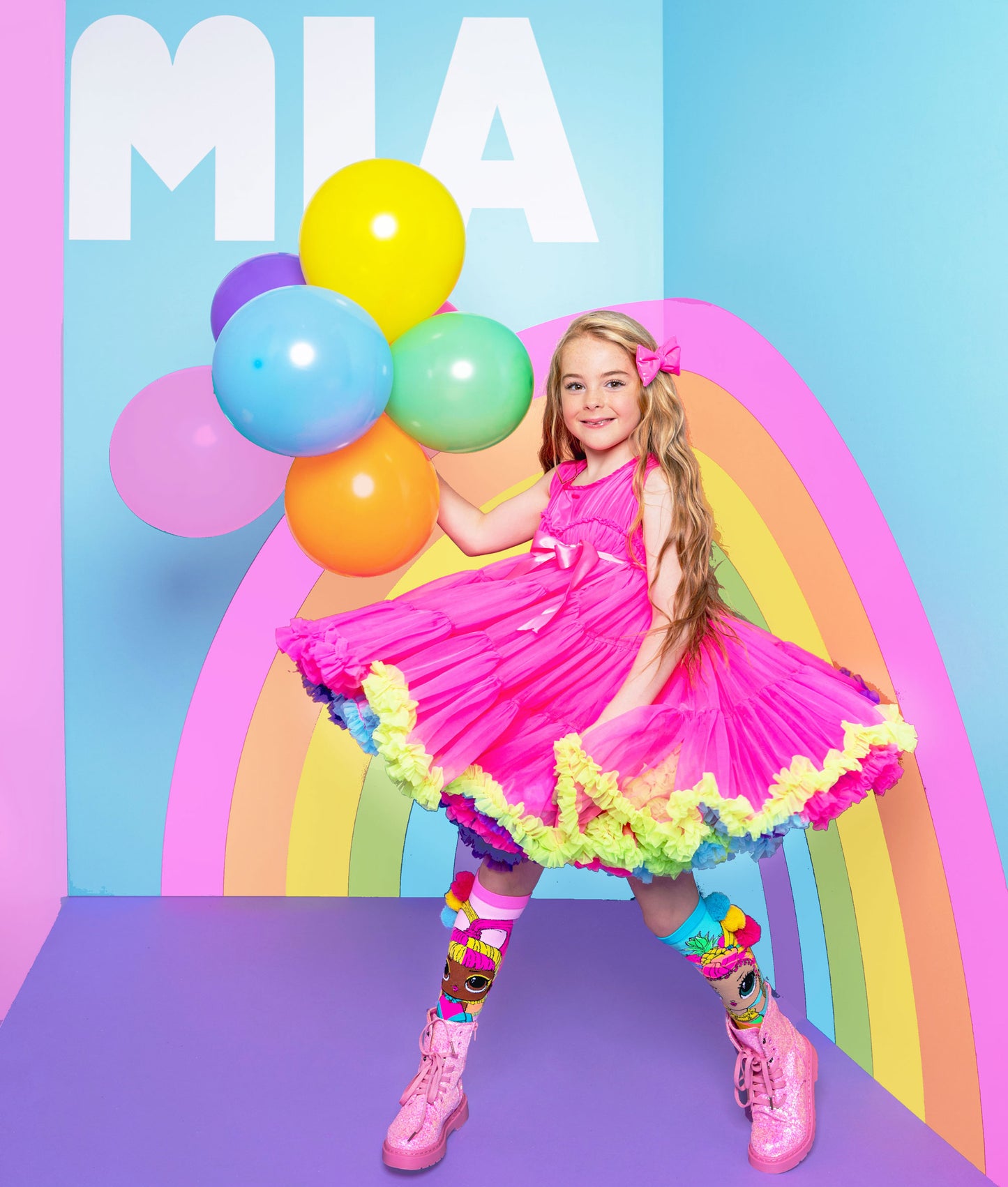 Colorful pink MADMIA Wonderland Dress with fluffy tulle and whimsical styling, perfect for birthdays and special occasions.